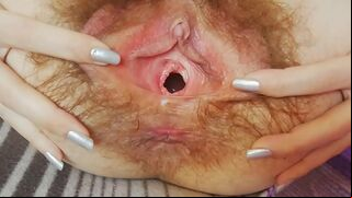 Mischievous camgirl tries to impress men with hairy bush and pissing