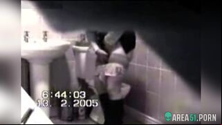 Сolleague in a miniskirt rubs her pussy after the piss, but my spy camera catch it all
