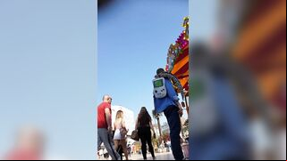 Candid camera in public place filming sexy ass under short skirt